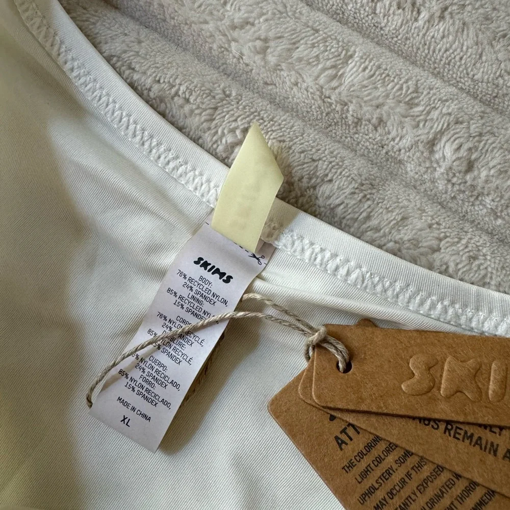 NWT SKIMS off white one piece swimsuit with cutouts Racerback